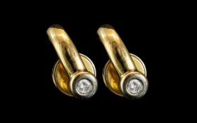 18ct Gold Diamond Earrings Each Set With A Round Modern Brilliant Cut Diamond Fully Hallmarked.
