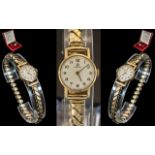 Omega - Ladies 9ct Gold Cased Mechanical Wrist Watch with Attached Gold Plated Expanding Bracelet.