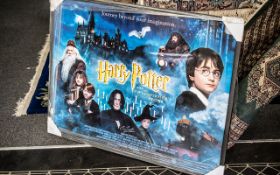 A Large Harry Potter and the Philosopher's Stone Framed Poster with Six Signatures to include,
