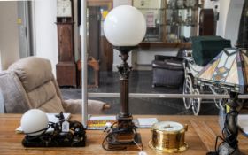 Tall Table Lamp with gilt painted column and stepped base, with round white globe shade.