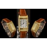 Jaeger-le-Coultre Ladies 18ct Gold Reverso Wrist Watch with Tan Leather Strap.