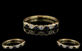 Ladies 9ct Gold - Attractive Diamond and Sapphire Set Dress Ring. Marked 750 to Interior of Shank.