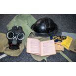 Military Interest - Green Canvas Bag containing a tin hat, gas mask in canvas bag,