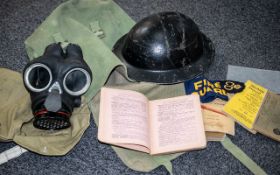 Military Interest - Green Canvas Bag containing a tin hat, gas mask in canvas bag,