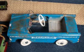 A Triang Pedal Car with painted blue white wheels with Bermuda Decal. Length 34 inches.