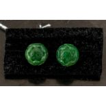 Carved Jade Lotus Flower Stud Earrings, the flower shown in a partly open stage,