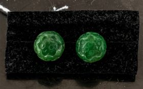 Carved Jade Lotus Flower Stud Earrings, the flower shown in a partly open stage,