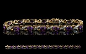 Ladies - Attractive and Contemporary 9ct Gold Diamond and Amethyst Set Bracelet.