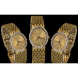 Patek Philippe - Vintage Ladies 18ct Gold and Diamond Set Oval Shaped Wrist Watch.