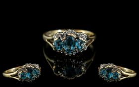 Ladies 9ct Gold Attractive - Aquamarine and Diamond Set Dress Ring. Fully Hallmarked for 9.375.