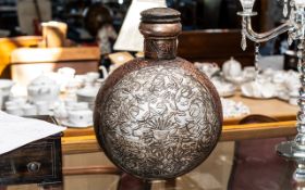 Antique Middle Eastern Oriental Water Carrier/Moon Flask, with embossed pattern and lid.