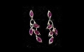Ruby 'Leaves' Drop Earrings, each earring having four marquise cut rubies set in an openwork drop,
