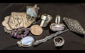 A Small Collection of Silver to include two hard stone rings, a hard stone pendant, dolphin ring,