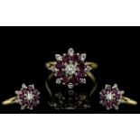 18ct Yellow Gold - Attractive Ruby and Diamond Set Dress Ring, Flower head Design.