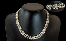 A Superb Quality Two Tone Cultured Pearl Necklace with 18ct Gold Ruby and Pearl Set Clasp.