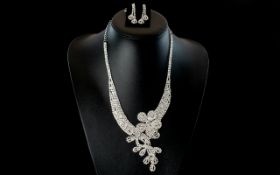 Asymmetric 'Flower and Leaves' White Crystal Necklace and Matching Drop Earrings, the necklace