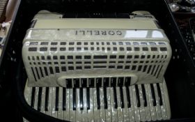 Cintage Corelli Universal Piano Accordion, cream colour, in fitted case. Measures 21" x 21".