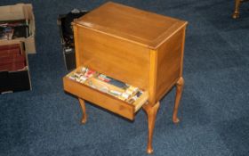 Teak Sewing Table, raised on four turned legs,