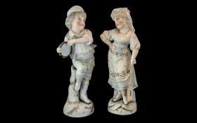 A Pair of Bisque Figures of a Boy and Girl c1900 Impressed number 4777. Each measuring 38 cms in