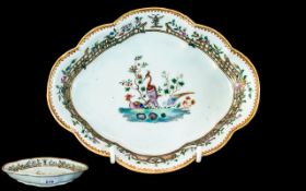 An Antique Chinese Lobed Dish, with central stylised peacocks. Length 8.25'' x 6.5''.