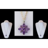 Ladies Attractive 9ct Gold Amethyst Set Pendant / Drop Attached to a 9ct Gold Chain.