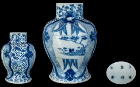 A 19th Century Chinese Blue and White Baluster Vase.