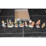 Collection of Goebel Hummel Figures, Musicians, eight in total, including conductor No.