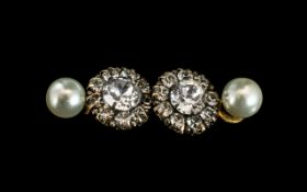 A Pair of 9ct Gold Antique Earrings set with clear paste. Diameter 12 mm. Together with a pair of