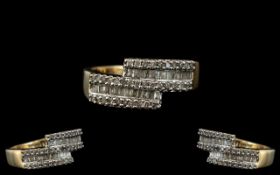 Ladies Nice Quality 9ct Gold - Diamond Set Designer Ring. The Baguette and Brilliant Cut Diamonds of