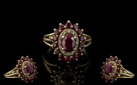 Ladies 9ct Gold - Attractive Ruby and Diamond Cluster Ring. Marked 9.