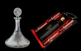 A Drinks Set comprising a Drinks flask and 4 glasses in a fitted case. Together with 2 cut glass