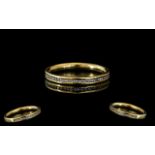 18ct Gold Diamond Band Set With Round Mo