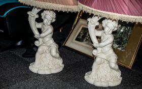 A Pair of Figural Painted Plaster Figure