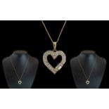 14ct Gold - Diamond Set Heart Shaped Pendant - Attached to a 14ct Gold Chain. Both Pendant and Chain