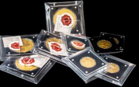 A Collection of Nine Fine Gold Foil Coins, 100th and 200th of an oz. Approx gross weight 3 grams