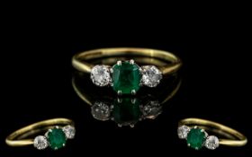 Ladies 18ct Gold and Platinum 3 Stone Diamond and Emerald Set Ring. Marked 18ct and Platinum to