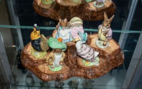 Collection of ( 5 ) Beswick Beatrix Potter Figures + A Beswick Beatrix Potter Stand, Which Fits 5