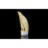 Whale Tooth Carved In the Form of a Penguin. Approx 5.5 Inches High.