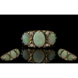 Ladies - Attractive 9ct Gold 3 Stone Opal and Diamond Set Ring. The 3 Large Opals with Diamond