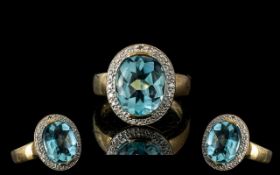 Ladies 9ct Gold Attractive Aquamarine and Diamond Set Cluster Ring. Full Hallmark to Interior of