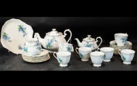 Royal Albert Bone China Tea Set 'Forget Me Not', comprising a large and small teapot, sugar bowl and