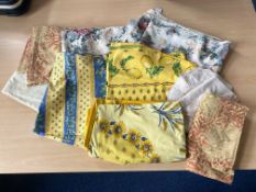 Quantity of Tablecloths, including two floral tablecloths, and a collection of blue and yellow