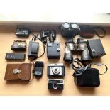 A Collection of Cameras to include Large pair of field binoculars,Med pair field binoculars in