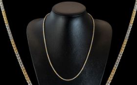 A Fine 9ct Two Tone Gold Ladies or Gents Chain / Necklace. Marked 9.375. Length 22 Inches - 55