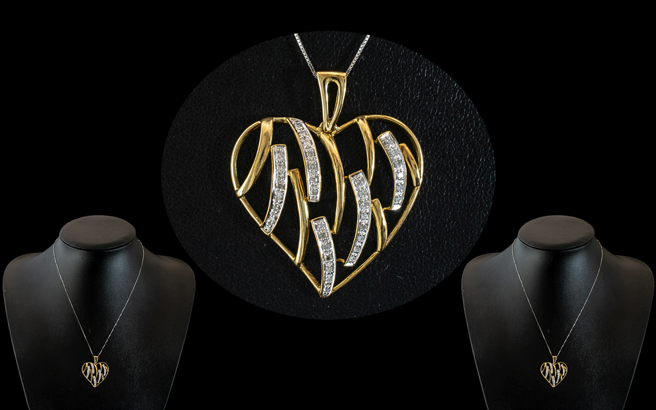 9ct Diamond Heart Shaped Pendant, set with round brilliant cut diamonds, with fine link chain.