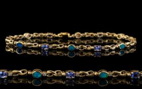 14ct Gold - Bracelet Set with Diamonds / Opals / Sapphires. Marked 14ct. Good Looking Bracelet -