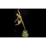 Art Deco Bronze Figure of a Nude Lady in a dance pose, raised on a green onyx plinth. Signed to base