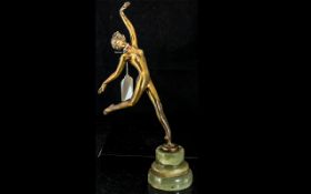 Art Deco Bronze Figure of a Nude Lady in a dance pose, raised on a green onyx plinth. Signed to base