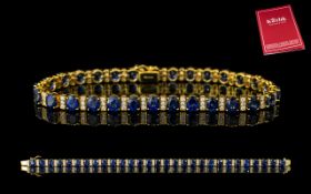 Ladies - Stunning and Attractive 18ct Gold Sapphire and Diamond Set Line Bracelet. Set with 29