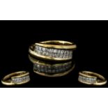 18ct Gold - Attractive Baguette Cut Diamond Set Ring. Marked 750 - 18ct to Interior of Shank. The